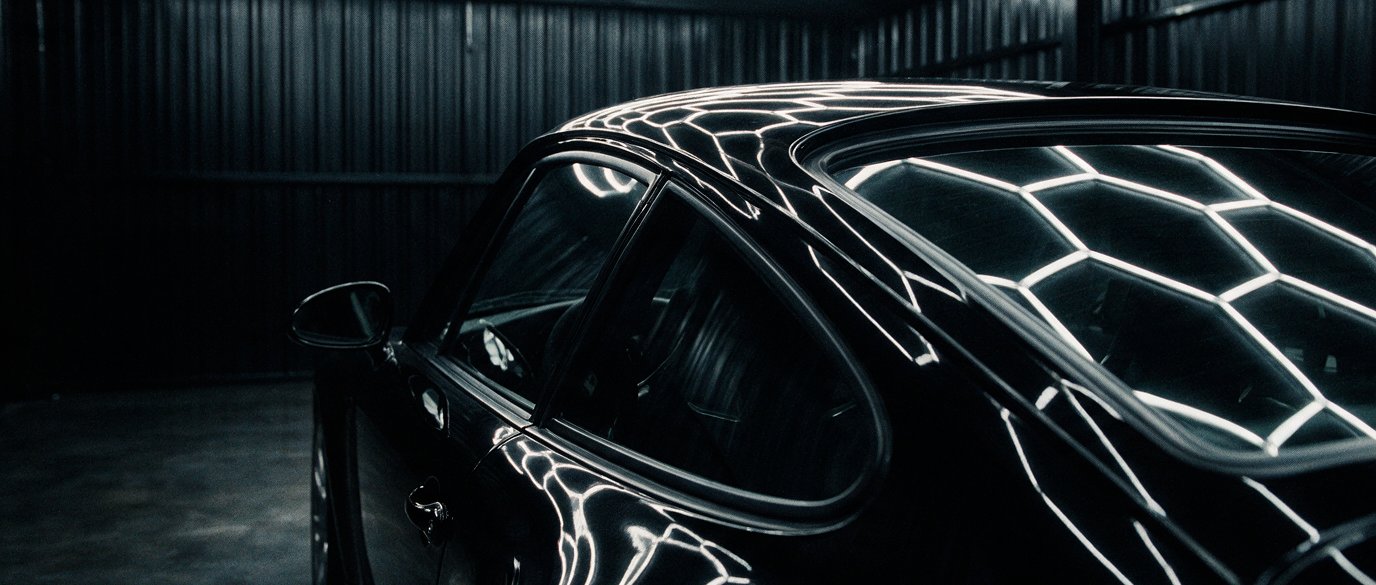 Light bars reflected across a ceramic coated roof